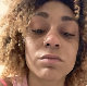 A black girl records herself shitting into a toilet in 4 different scenes featuring poop action from a rear perspective. Presented in 720P HD. Over a minute.